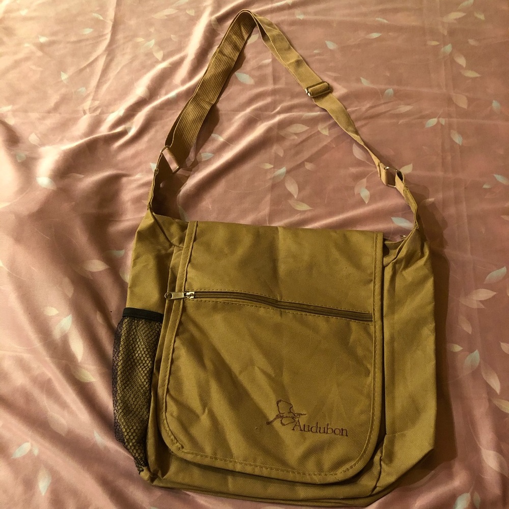 - CrossBody bag with water bottle holder